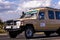 Landcruiser Toyota vehicle van parked in the Savannah grasslands of the Maasai Mara National Game Reserve park Rift Valley