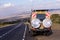 Landcruiser Toyota vehicle van parked in the Savannah grasslands of the Maasai Mara National Game Reserve park Rift Valley