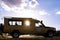 Landcruiser Toyota vehicle van parked in the Savannah grasslands of the Maasai Mara National Game Reserve park Rift Valley