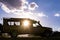 Landcruiser Toyota vehicle van parked in the Savannah grasslands of the Maasai Mara National Game Reserve park Rift Valley