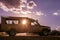 Landcruiser Toyota vehicle van parked in the Savannah grasslands of the Maasai Mara National Game Reserve park Rift Valley