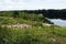 Landfill of building debris on the banks of the river