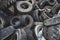 Landfill with old tires and tyres for recycling. Reuse of the waste rubber tyres. Disposal of waste tires. Worn out wheels for