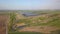 Landfill for solid waste of a thermal power plant. Aerial video of a crowded ash dump. Ash, slag, waste, landfill.