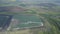 Landfill for solid waste of a thermal power plant. Aerial video of a crowded ash dump. Ash, slag, waste, landfill.