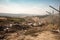 a landfill surrounded by a fence to discourage illegal dumping