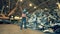 Landfill worker is observing a pile of broken office machines. Recycling industry, used electronic recycling factory.