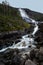 Landfoss Waterfall 2000 ft tall cascade flowing into Akrafjorden