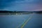 Landing lights at night on airport runway