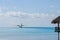 Landing of a seaplane on the turquoise maldivian lagoon. luxurious travel concept