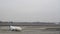 Landing and take-off of an airplane at an international airport in cloudy weather