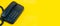 Landline telephone device on yellow background