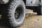 LANDMANNALAUGAR, ICELAND - AUGUST 2018: close-up of car all-terrain tires on the mud road