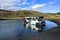 LANDMANNALAUGAR, ICELAND - AUGUST 6, 2019: Merzedes Vito car with engine damage during crossing a river in Iceland