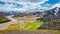 Landmannalaugar, Iceland. Bird view at camping site and mountain hut with many tents and cars, Icelandic landscape of colorful