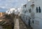 Landmark of Asilah - Atlantic Ocean Surf and Old City Wall with white houses on Seaside. Asilah, Morocco