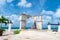 landmark statue with arch. cozumel landmark statue with arch at seafront.