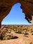 Landscape of Altiplano. Sunny clear blue sky day. View through rock window on lava field. Bolivia