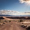 The landscape of Alvord Desert, Oregon has a dried lake bed and desert terrain w...