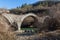 Landscape of Ancient Bridge of Missios in Vikos gorge and Pindus Mountains, Zagori, Epirus, Greece