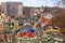 Landscape of an autumn city with a view of the restored roofs and buildings of Vozdvizhenka, the old district of Podil in the city