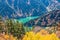 Landscape of autumn forest and blue lake, Tateyama Japan Alps