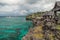Landscape azure sea and a rocky coast with tropical houses Crystal Cove small island near Boracay island in the