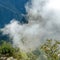 Landscape background with mountains in the clouds from the top of the Machu Piccu mountain