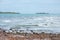 Landscape of the beach at sunset with island at the horizon, horiozontal