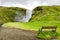 Landscape with beautiful Skogafoss waterfall, Iceland