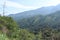 A landscape of a beautiful sloping area and the mountains