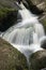 Landscape of Becky Falls waterfall in Dartmoor National Park Eng