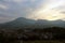 The landscape of Beppu in Oita and golf range as seen from a hill in sunset