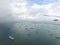 Landscape from bird eye view seascape of dense rows of cargo ship from airplane window.