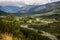 Landscape of Blue river, valley and forest in El Bolson, argentinian Patagonia