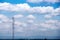 Landscape blue sky with white clouds group pattern floating and high antenna transmission tower on background