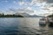 Landscape of boat dock on a lake with beautiful mountain as the background at Queenstown in New Zealand