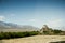 Landscape with Buddhist monastery and mountains