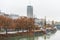 Landscape with buildings and skylines at the riverbank of Donaukanal Danube cannal  in a rainy day,  , in Vienna, Austria