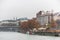 Landscape with buildings and skylines at the riverbank of Donaukanal Danube cannal  in a rainy day,  , in Vienna, Austria