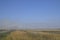 Landscape burning field. The burning of rice straw in the fields. Rice paddies