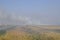 Landscape burning field. The burning of rice straw in the fields. Rice paddies