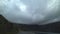 Landscape with car moving. Road between mountains.