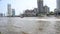 Landscape and cityscape with many boat in traffic water at chao phraya river