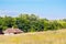 Landscape clay and wooden hut thatched Ukrainian