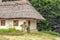 Landscape clay and wooden hut thatched Ukrainian