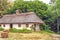 Landscape clay and wooden hut thatched Ukrainian