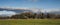 Landscape with clouds, field and forest