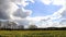 Landscape clouds trees and in April