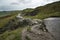 Landscape of collapsed A625 road in Peak District UK